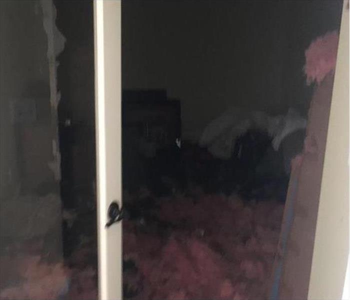 bedroom with fallen insulation