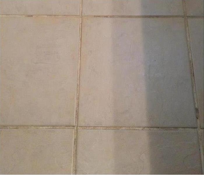 White tile that is very dirty