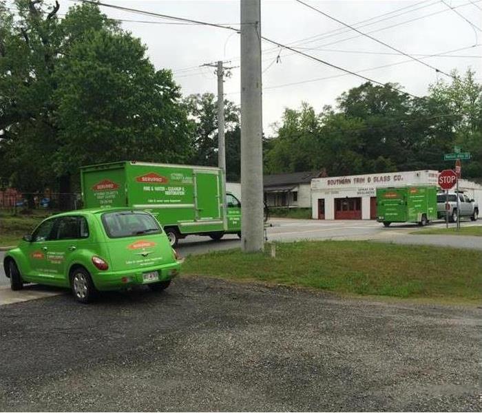 SERVPRO vehicles leaving the parking lot